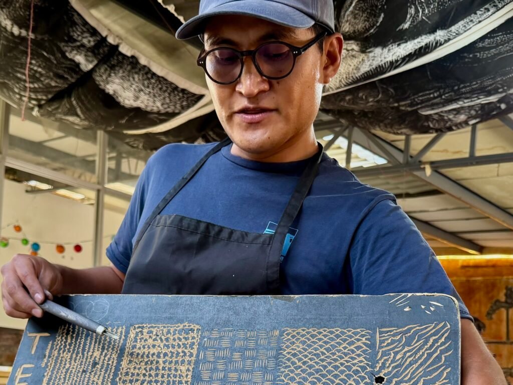 Adisa + Joan took some woodcut classes - look up.